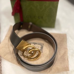 Authentic Gucci belt reversible . Excellent condition .